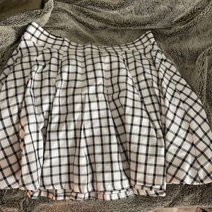 Pink and black plaid skirt